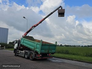 Strona kierowcy z tyłu — MAN 26.400 TGS 6X4H-4 EEV HMF CRANE z 2012 roku