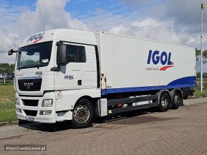 Strona kierowcy z przodu — MAN 26.440 TGX 6X2 TAILLIFT z 2009 roku