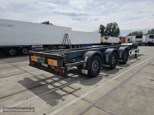 Strona pasażera z tyłu — Renders CHASSIS PORTMASTER z 2009 roku