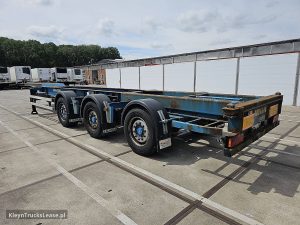 Strona kierowcy z tyłu — Renders CHASSIS PORTMASTER z 2009 roku